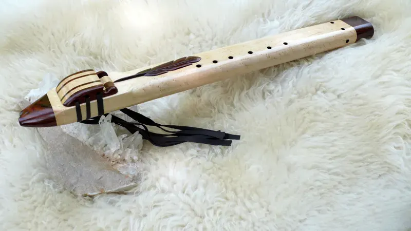 Native American Style Drone Flute 7 Hole in the Key of Low D of Bird's Eye Maple and Cocobolo woods with Feather Carving — product photo